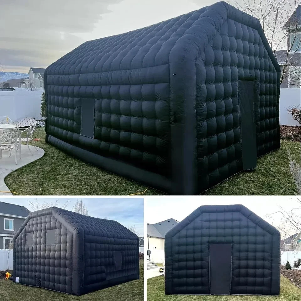 Black inflatable nightclub exterior set up on grass